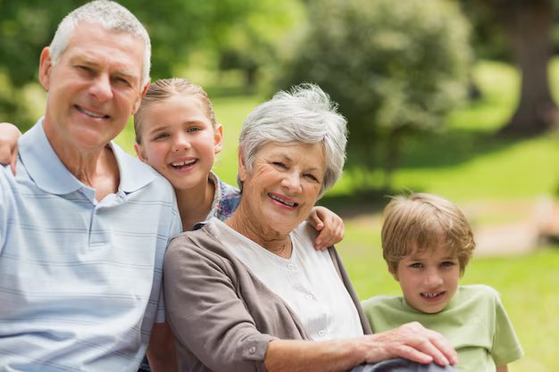 Kalmazoo life insurance professionals page with pic of seniors with their grandchildren